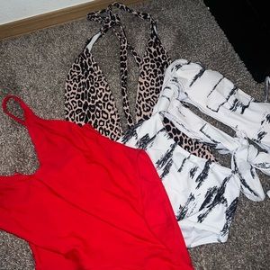 Never worn bundle of 3 one piece swim sets